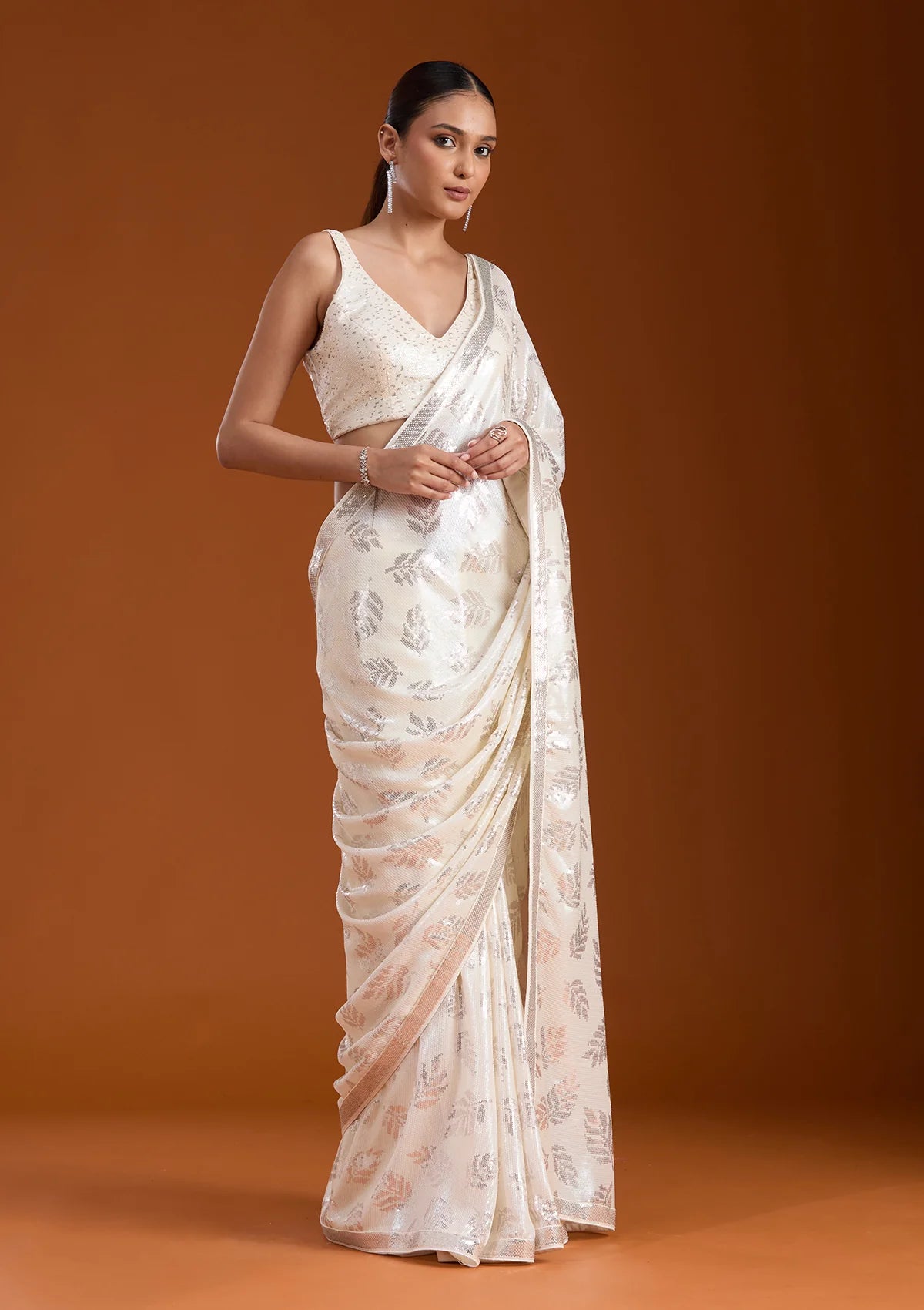 Off White Georgette Sequins Saree With Matching Blouse Piece