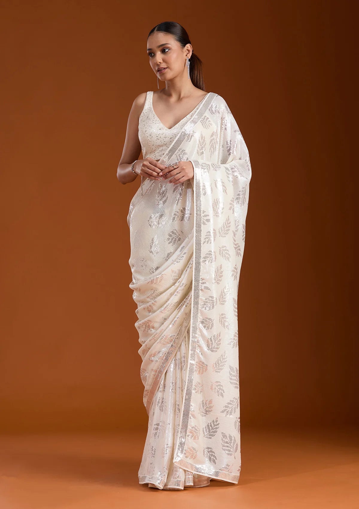 Off White Georgette Sequins Saree With Matching Blouse Piece